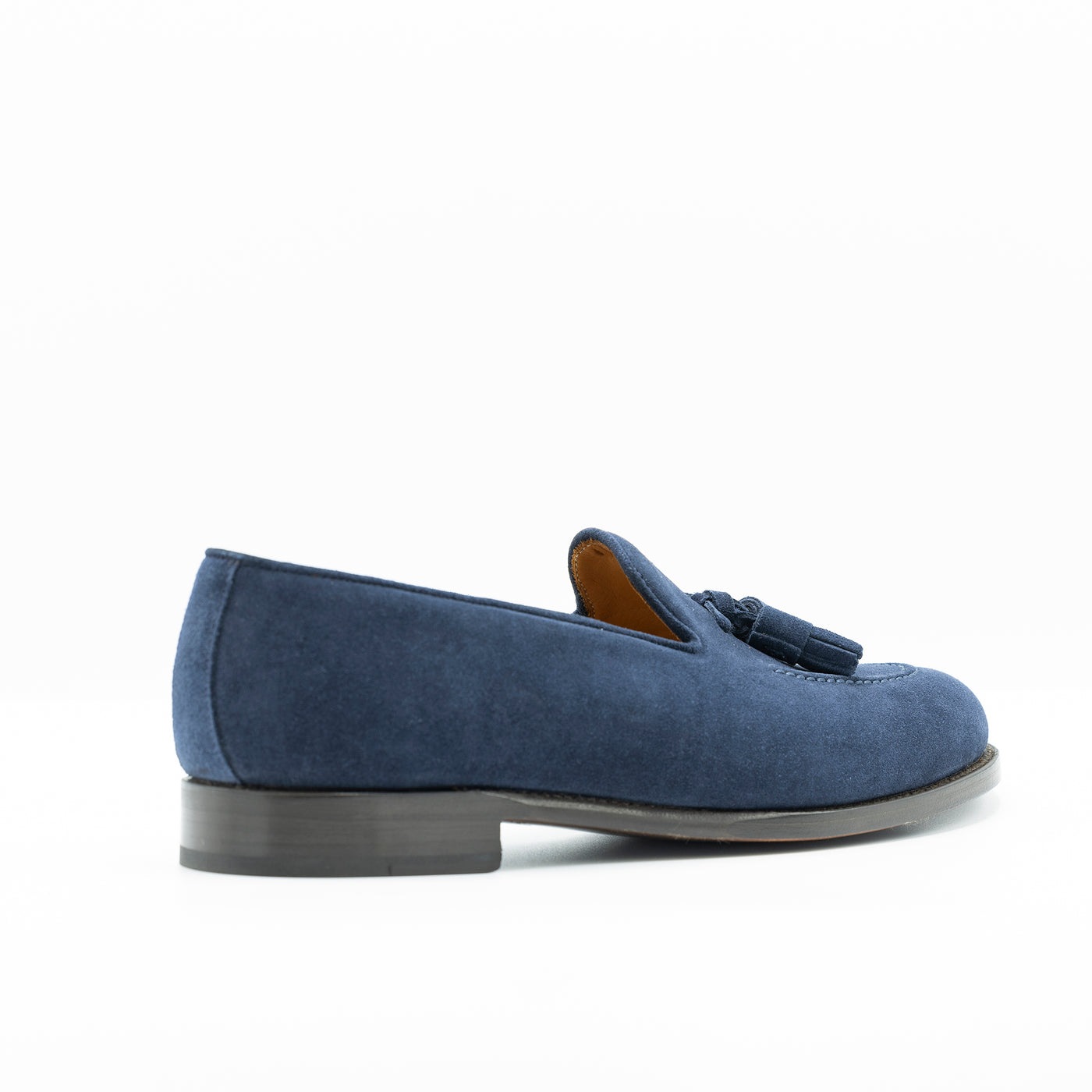 Men's blue suede tassel loafer on edgestitched leather soles.  