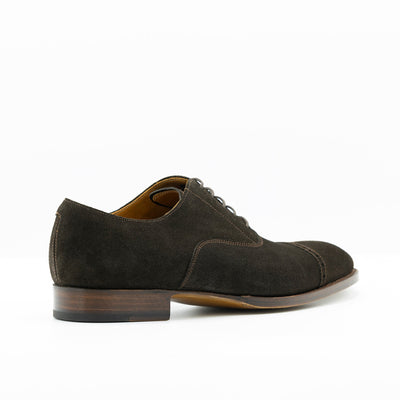 Brown Suede oxford shoes with edgestiched leather soles and waxed shoe laces.