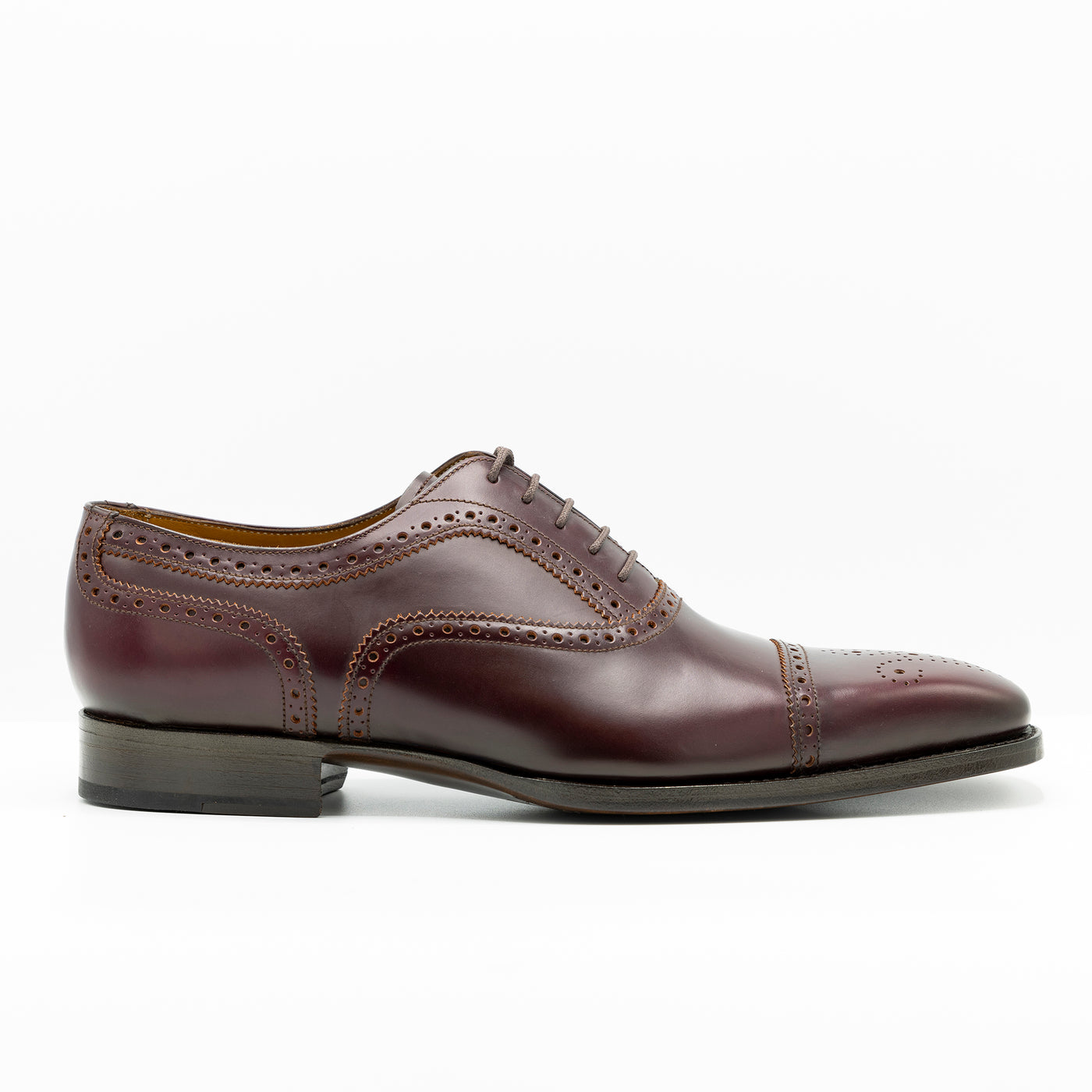 Oxford leather shoes in ruby leather with goodyear welted leather soles and waxed shoe laces. 