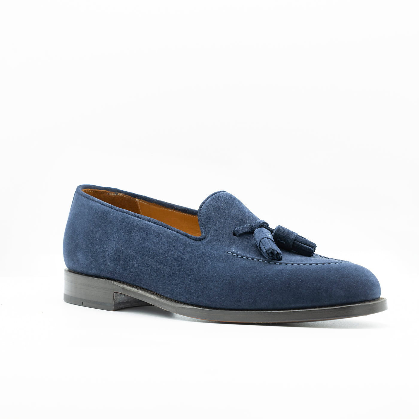 Men's blue suede tassel loafer on edgestitched leather soles.  