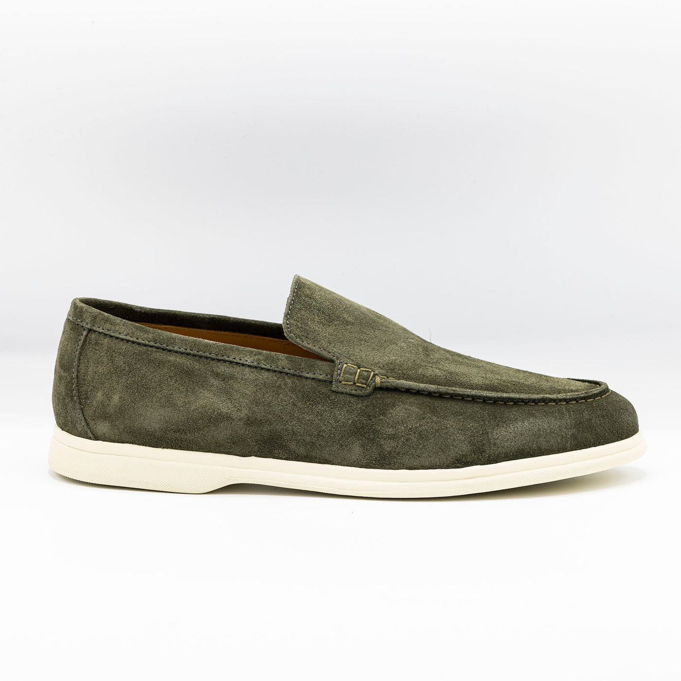 City loafer, Summer walk in khaki suede set on a white rubber sole. 