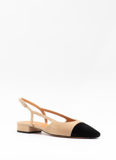 Beige suede flats with black toe