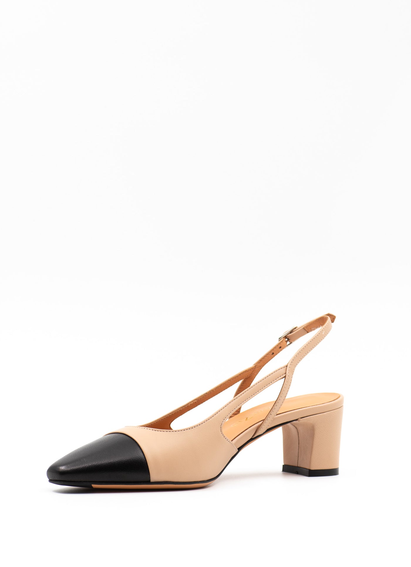 Black and beige pumps