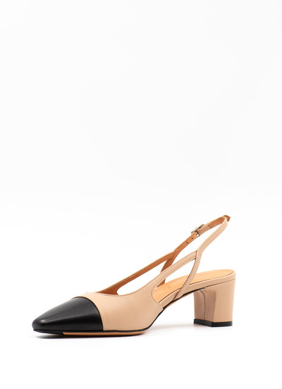 Black and beige pumps