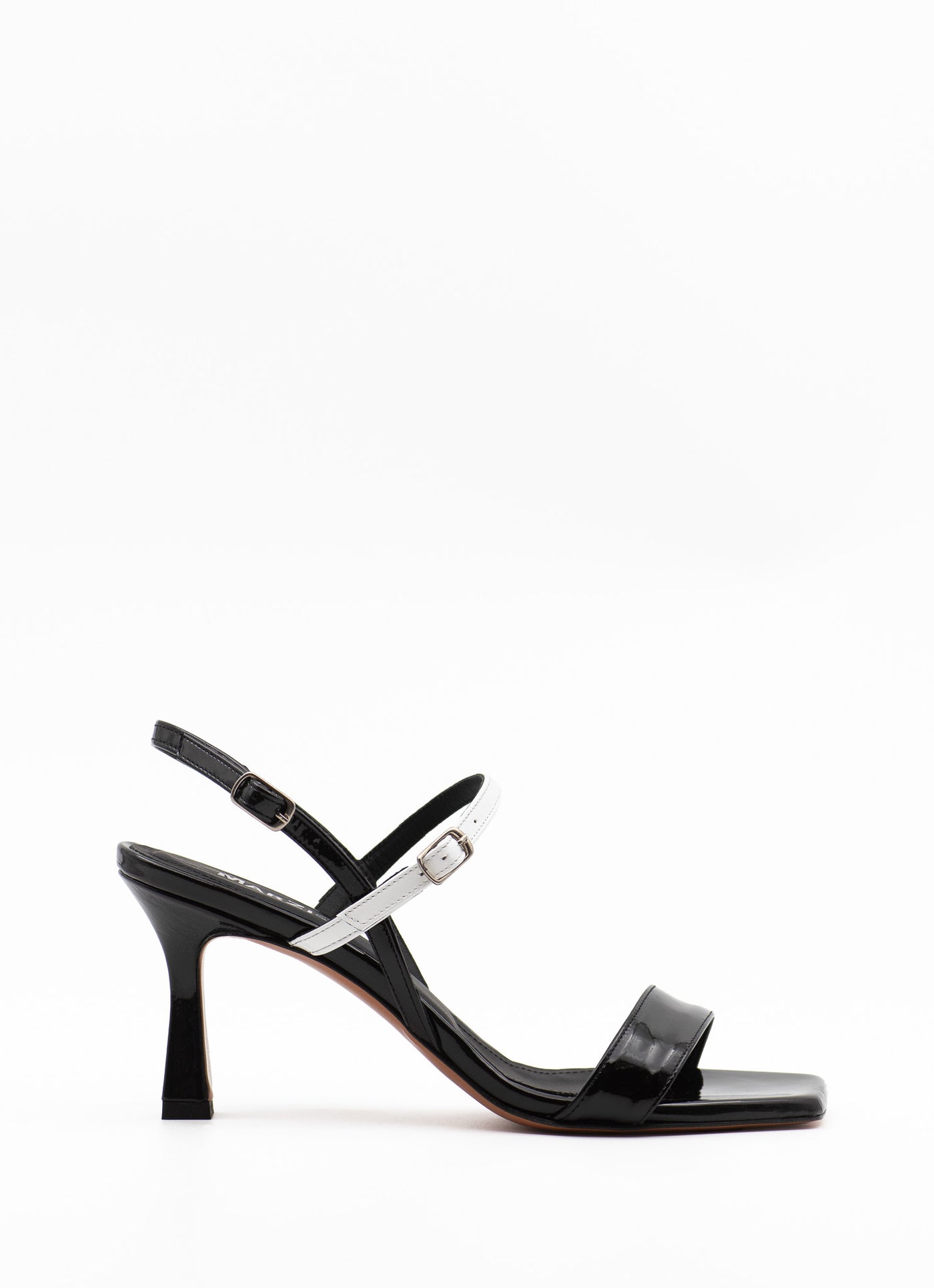Barely there sandals in black patent