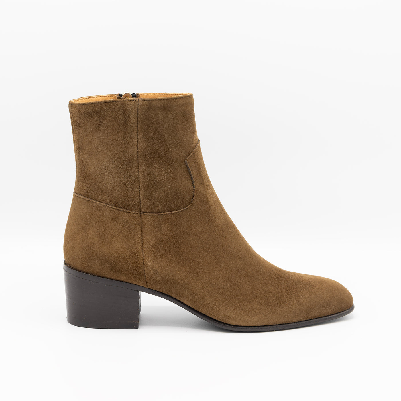 Ankle boots in cognac suede with block heel and almond toe. 