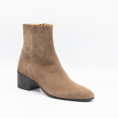Beige suede block heeled boots with almond toe. 
