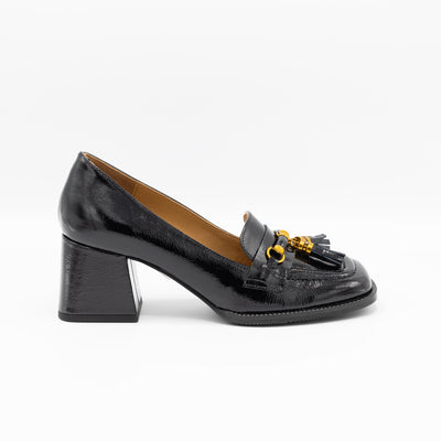 Black patent leather loafers with gold hardware and block heel