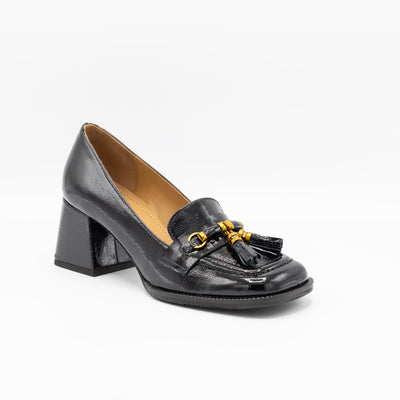 Black patent leather pumps with gold hardware
