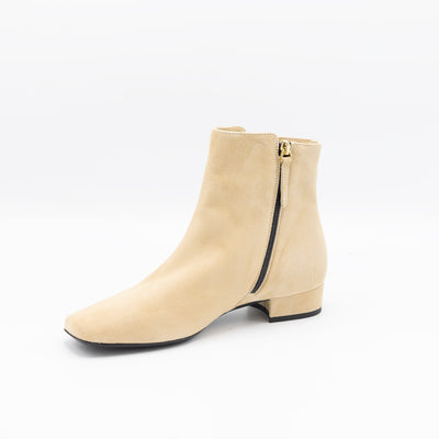 Elegant beige booties with square shaped toes