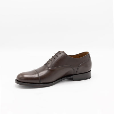 Good year welted cap toe derbies in brown leather. 