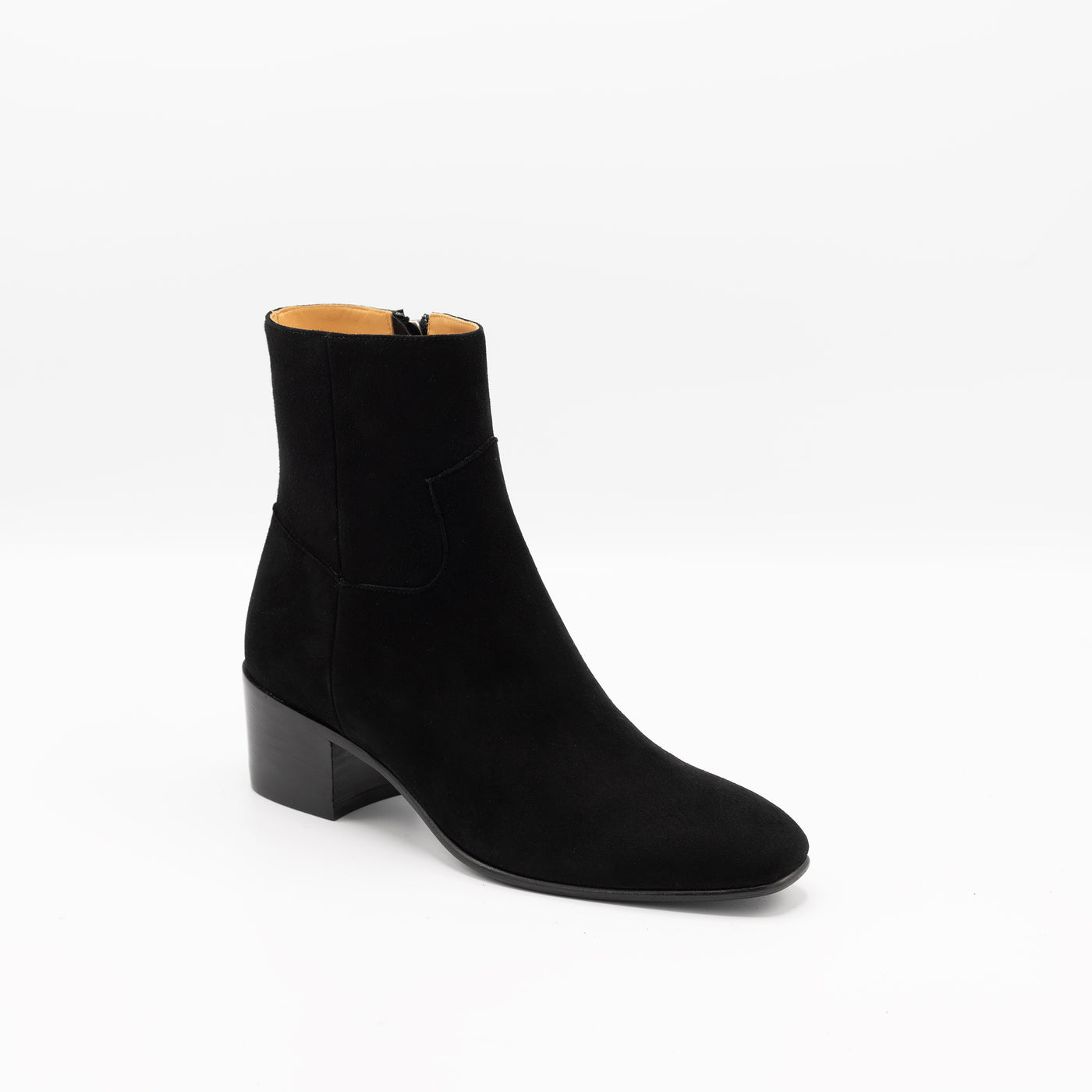 Black suede leather ankle boots with block heel and almond toe. 