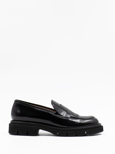 Chunky black patent leather loafers