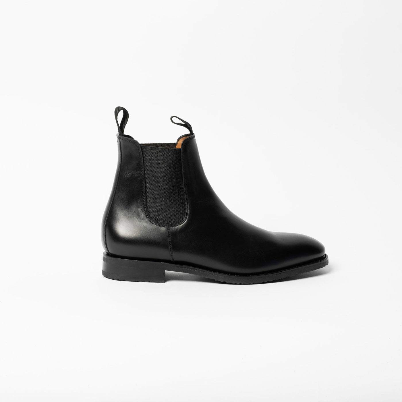 Black Leather Chelsea Boots with rubber sole. 