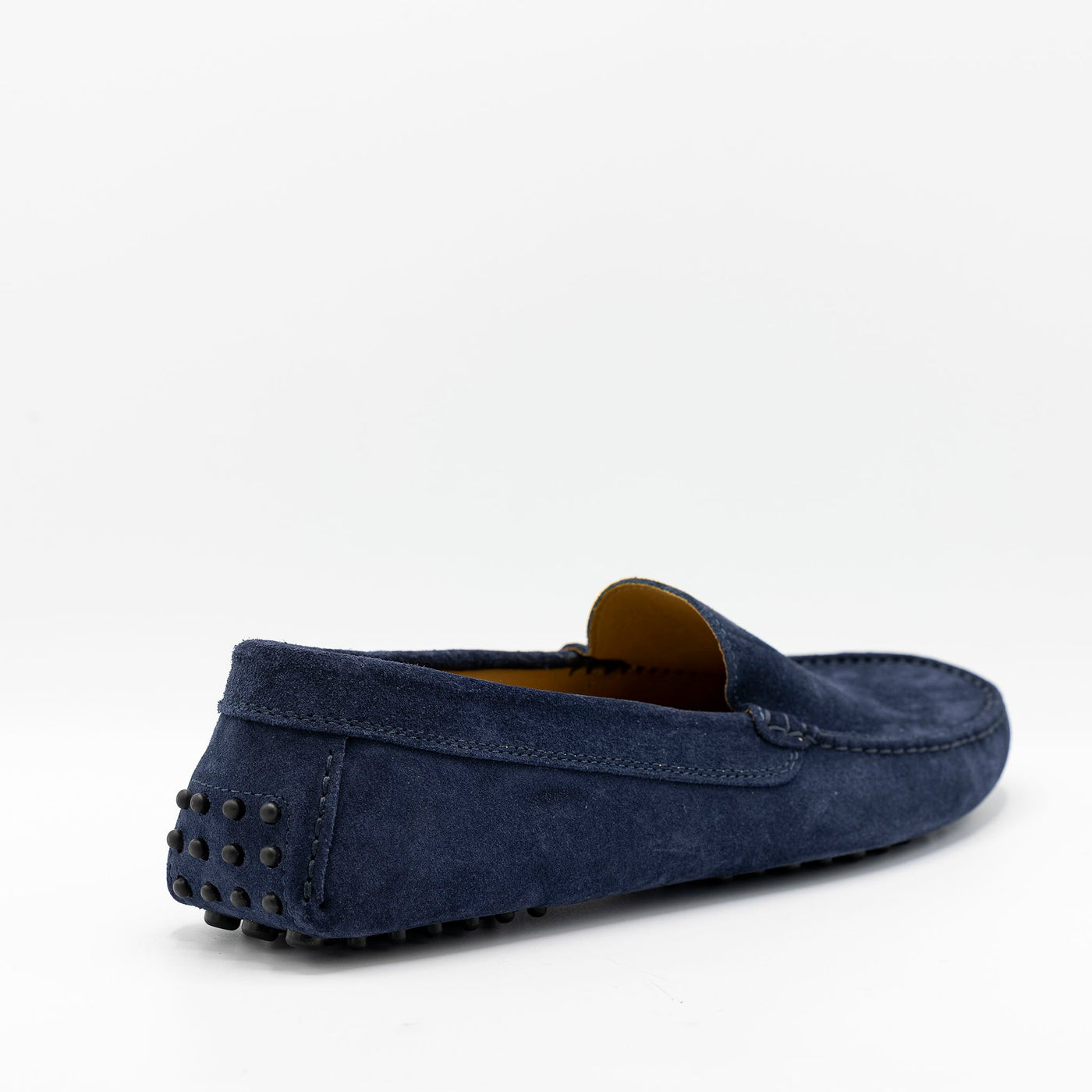 Plain car shoe with rubber pebbles underneath the sole. Made from Navy Blue calf suede. 