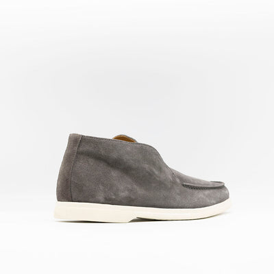 Open walks in grey suede on white rubber sole. 
