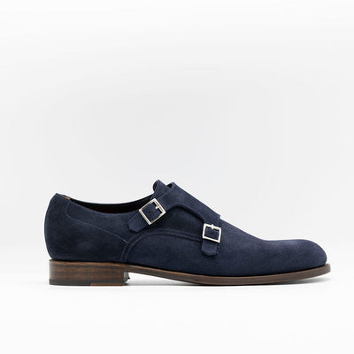 Monk strap shoe in navy suede. Double straps egdestiched leather soles. 