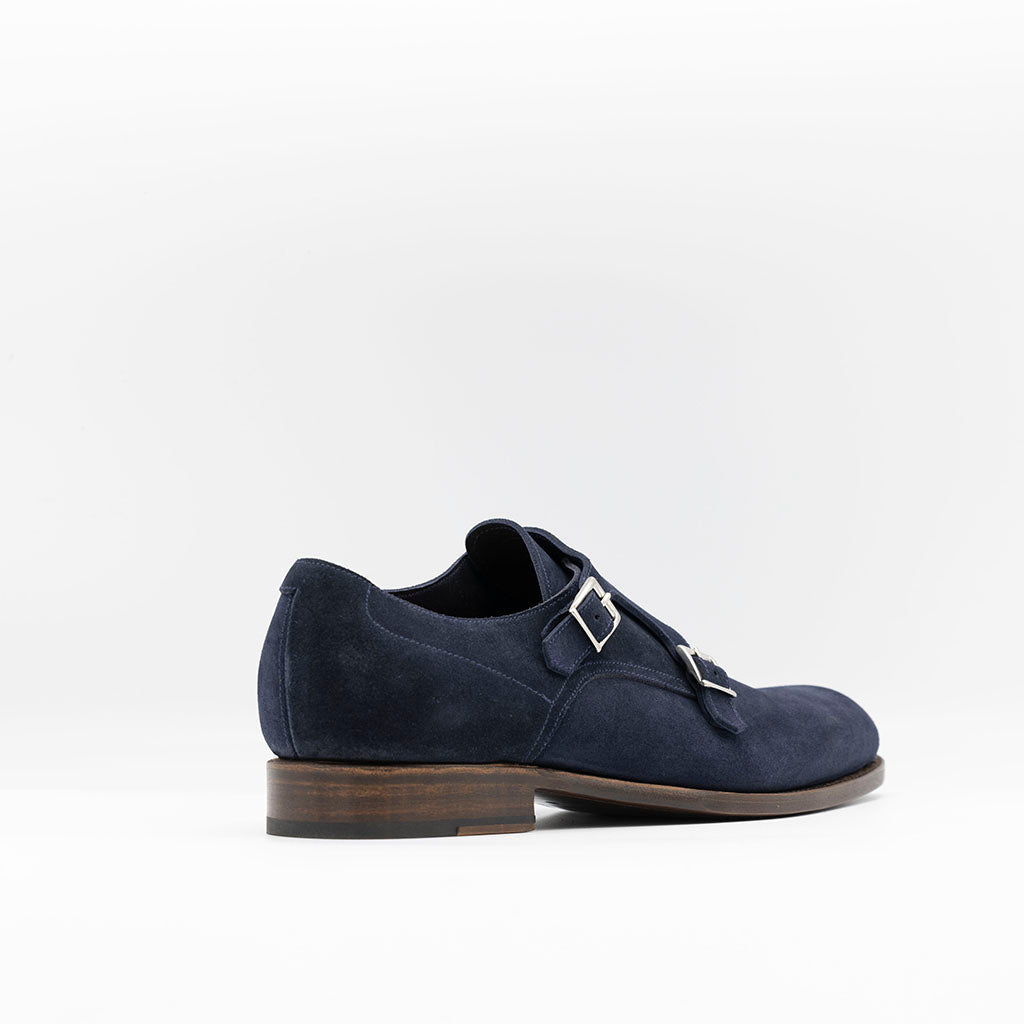 Monk strap shoe in navy suede. Double straps egdestiched leather soles. 