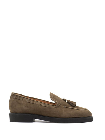 Penny loafers in green suede