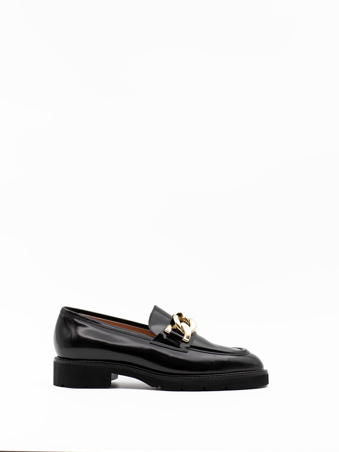 Black patent leather loafer with a gold chain 