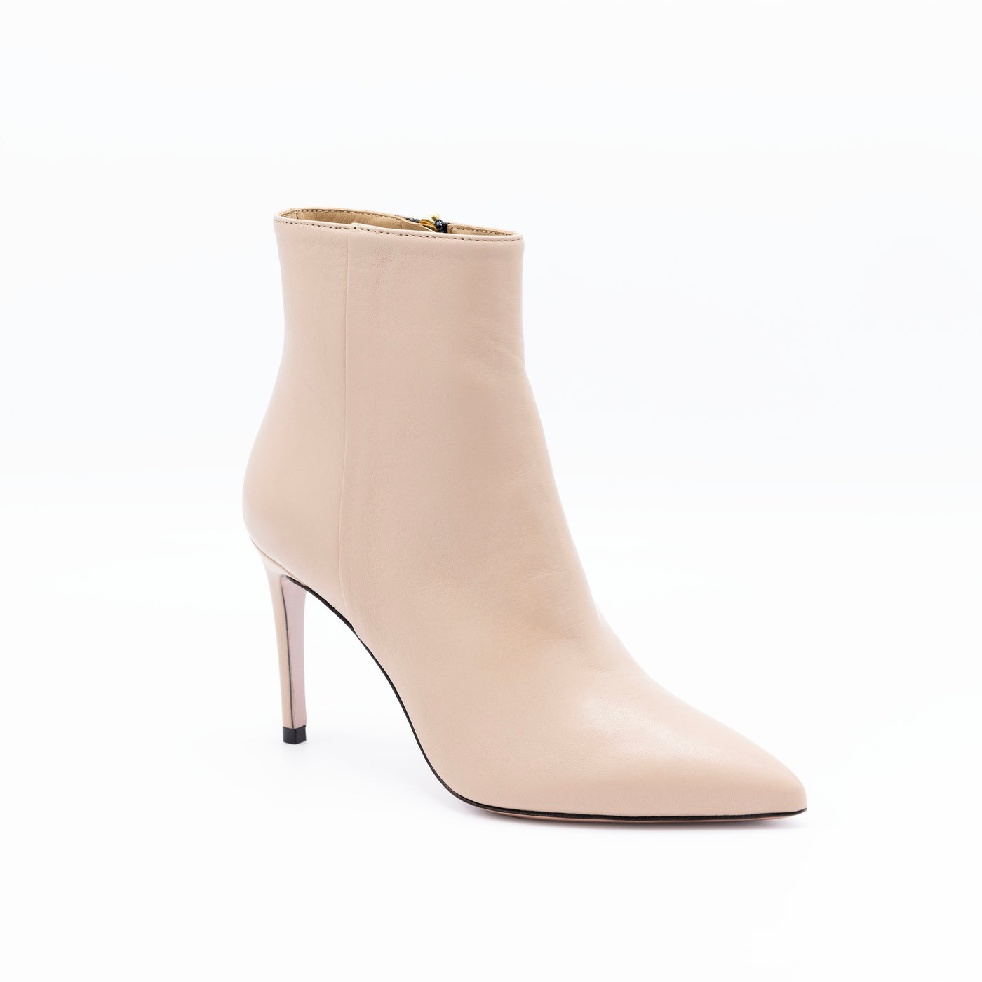 Beige leather pointy toe ankle boots with slim heel