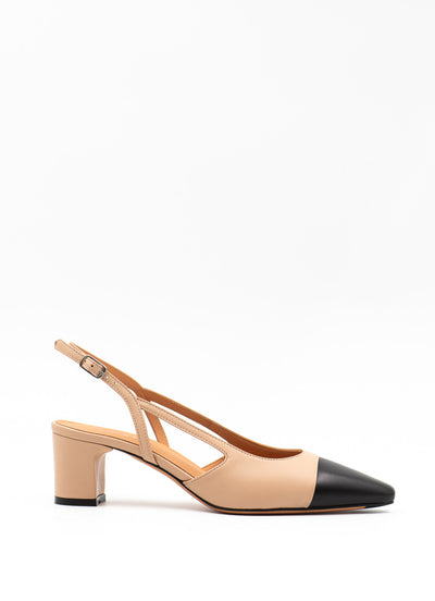 Beige leather pumps with black toe