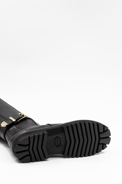 Knee-high boots with buckle and Vibram sole