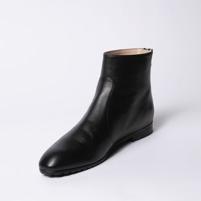 Round toe black leather ankle boots. 