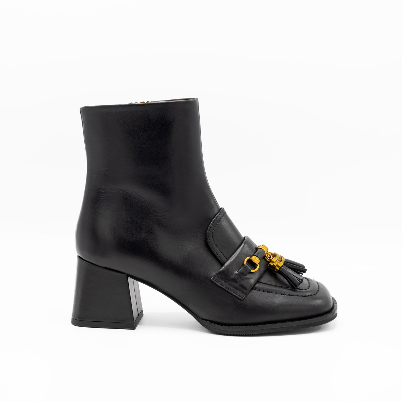 Black ankle boots with horsebit and tassle
