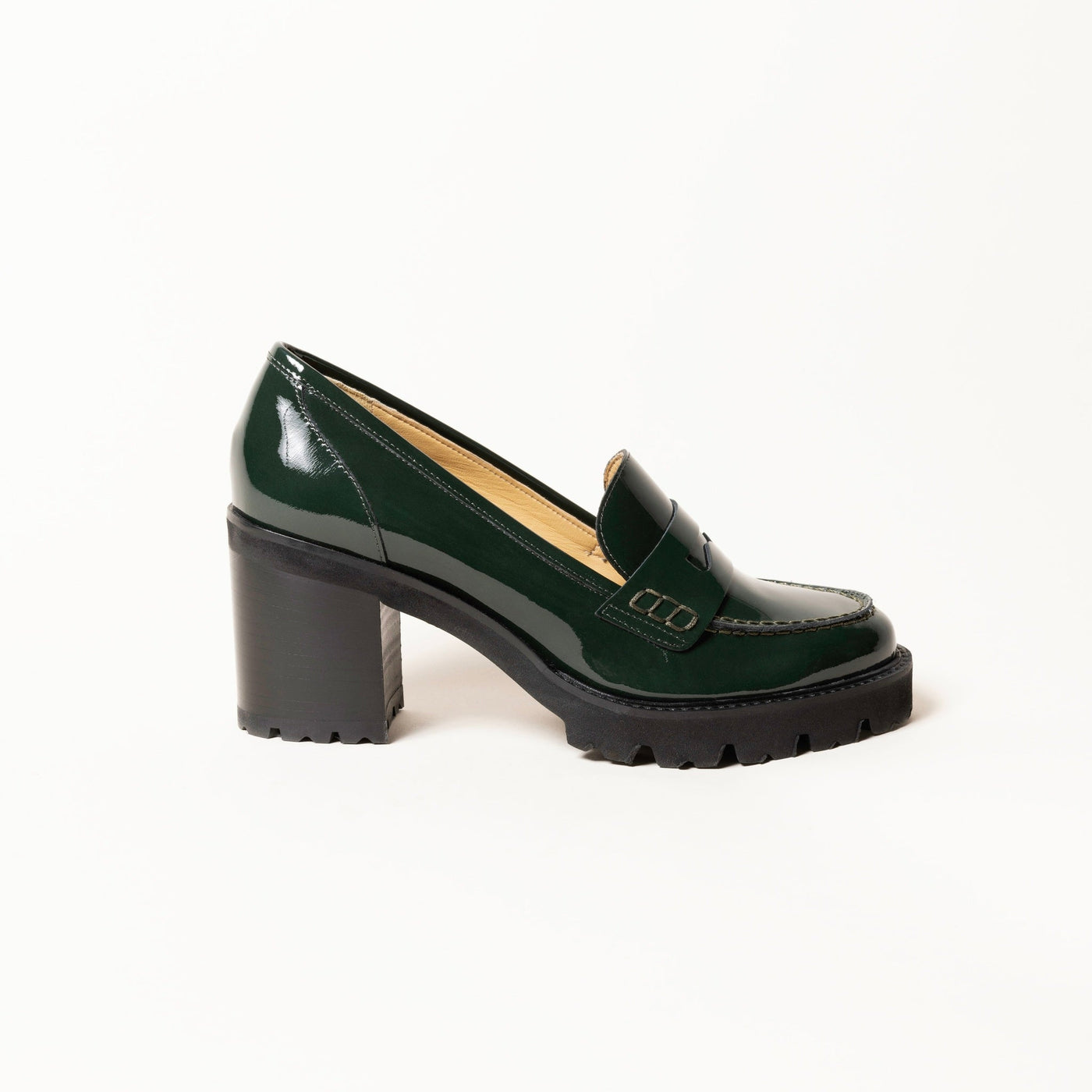 Loafer pumps in green patent leather