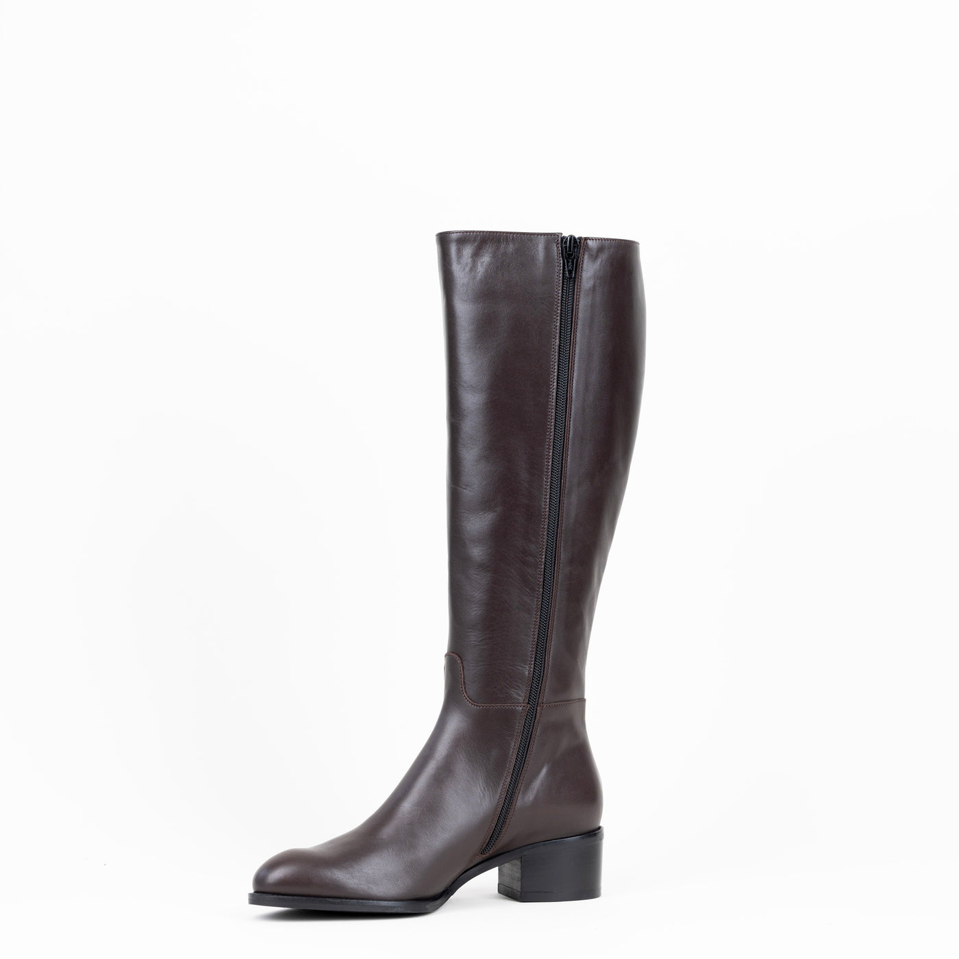 Women's classic brown leather boots with zipper on the inside.
