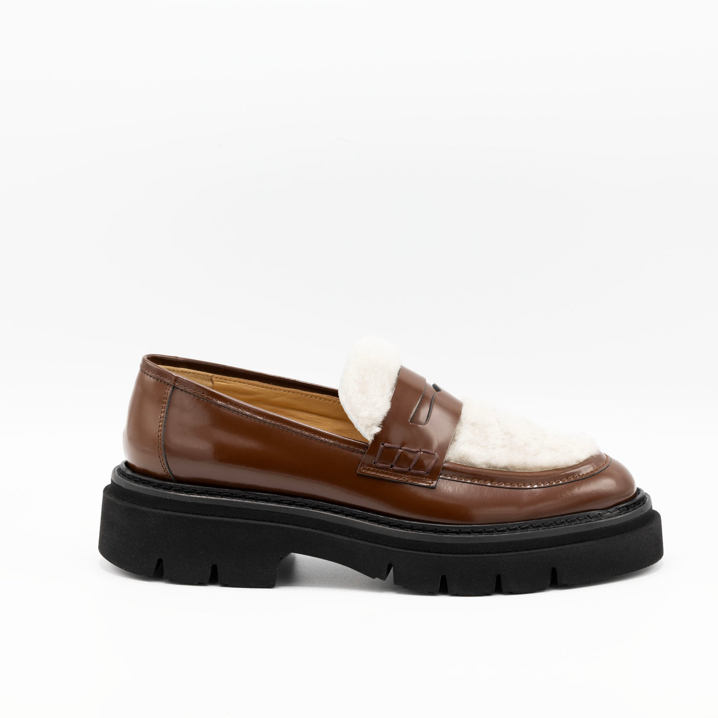 Brown leather loafers with shearling uppers