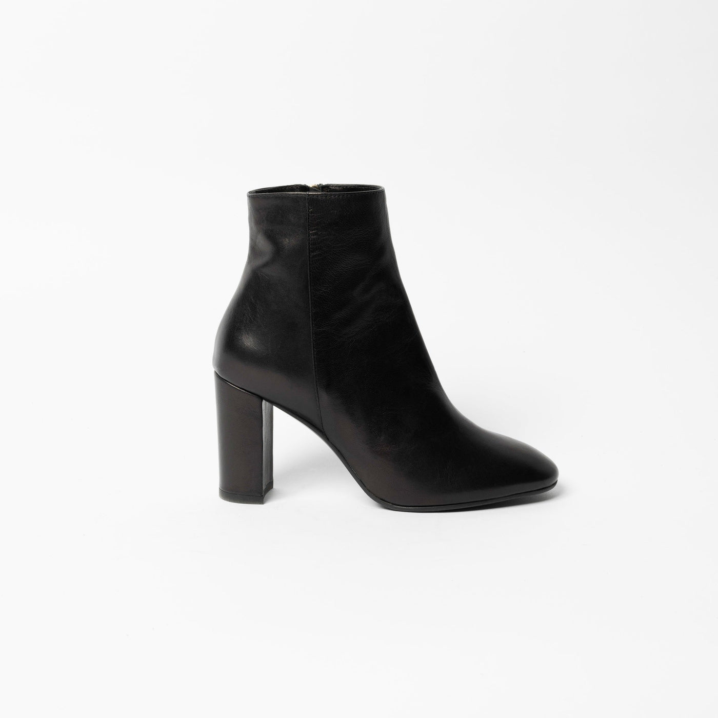 Black leather ankle boots with block heel.