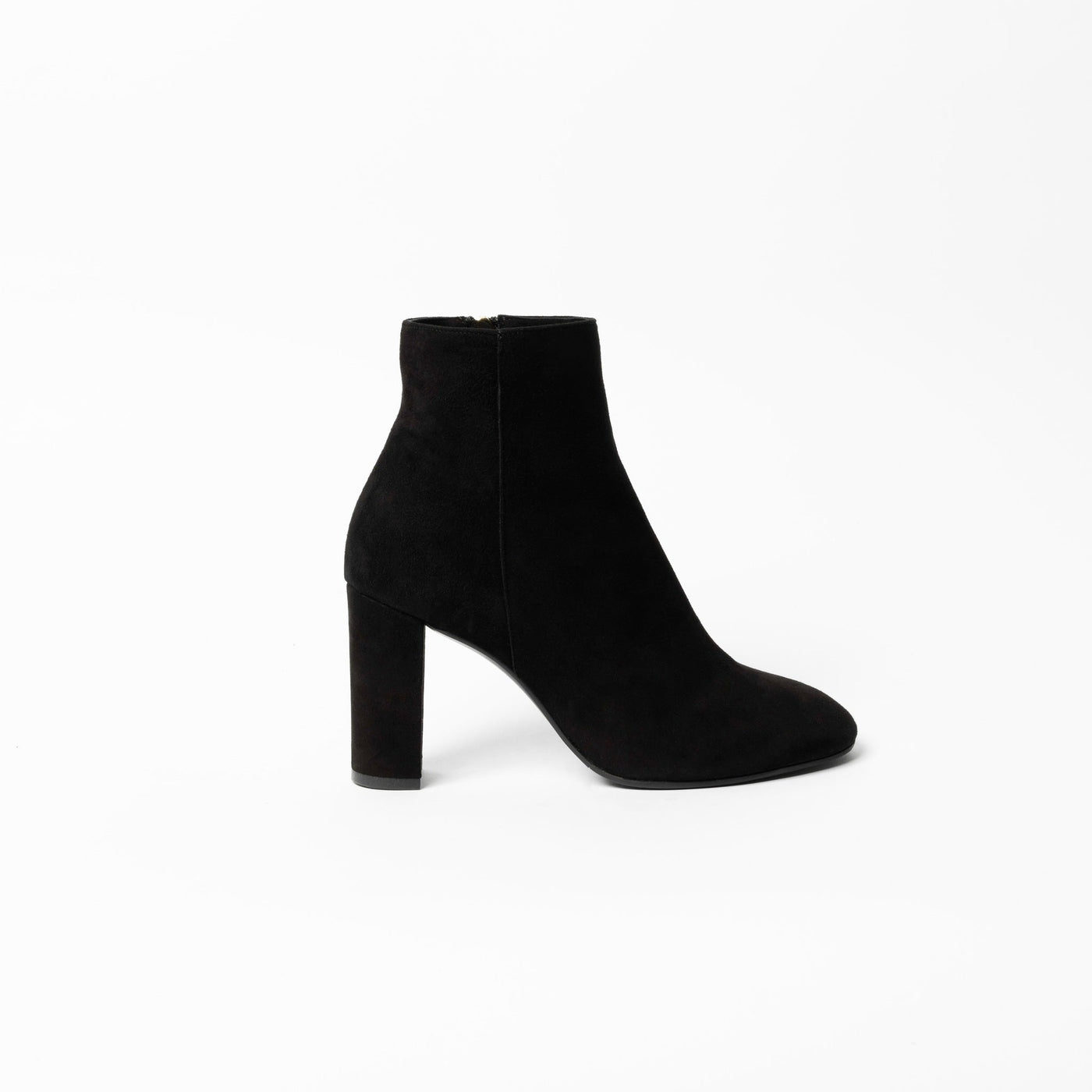 Black suede ankle boots with block heel. 