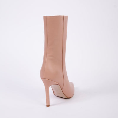 Ankle boots with stiletto heel in beige leather. 