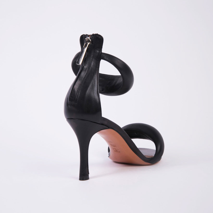 Cleopatra sandal in black - Heeled sandal with 80 mm stiletto heel. Ankle and toe strap are padded. Hidden zipper. 