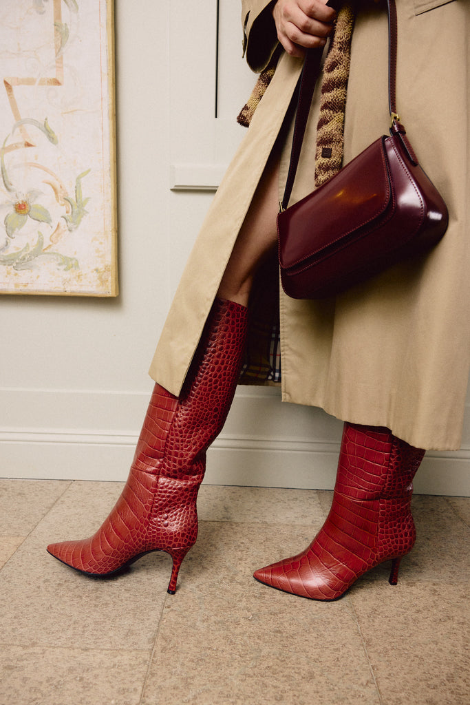 Red croco printed leather boots. 