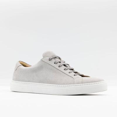 Men's classic sneaker in light grey suede with white rubber soles. 