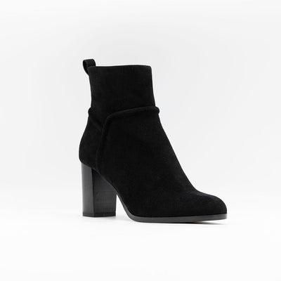 Black suede ankle boots set on a block heel.