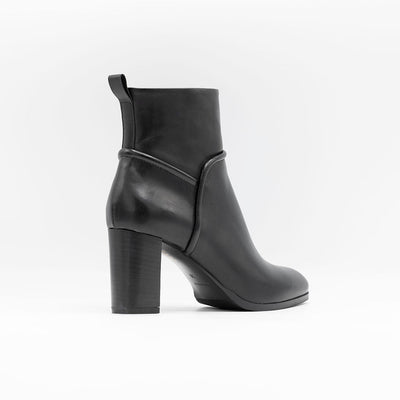 Black ankle boots with mid-high block heel. 