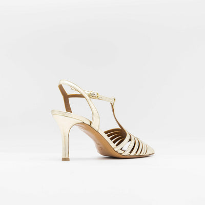 Caged gold leather pumps