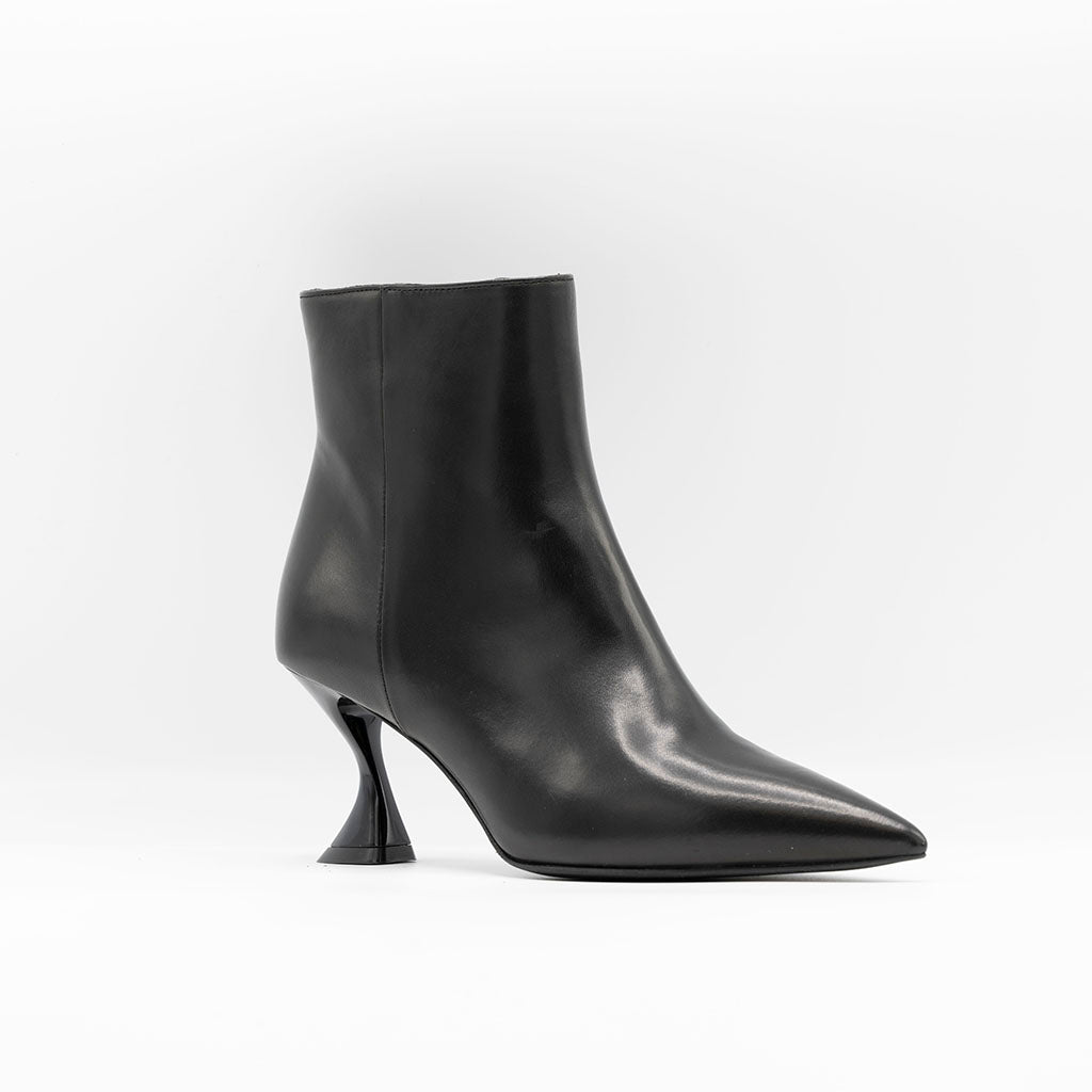 Black leather ankle boots with curved heel. 