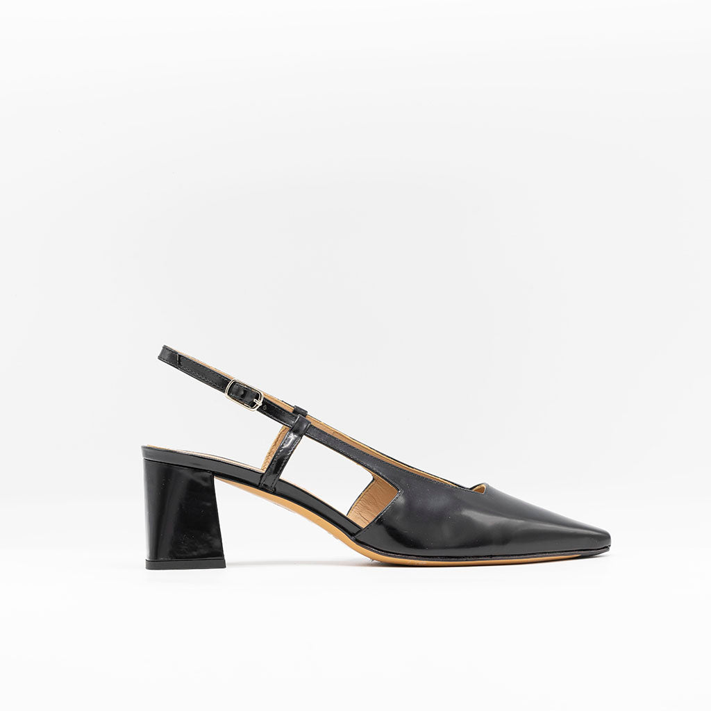 Block heeled slingback with slightly slanted heel and square toe in black patent. 