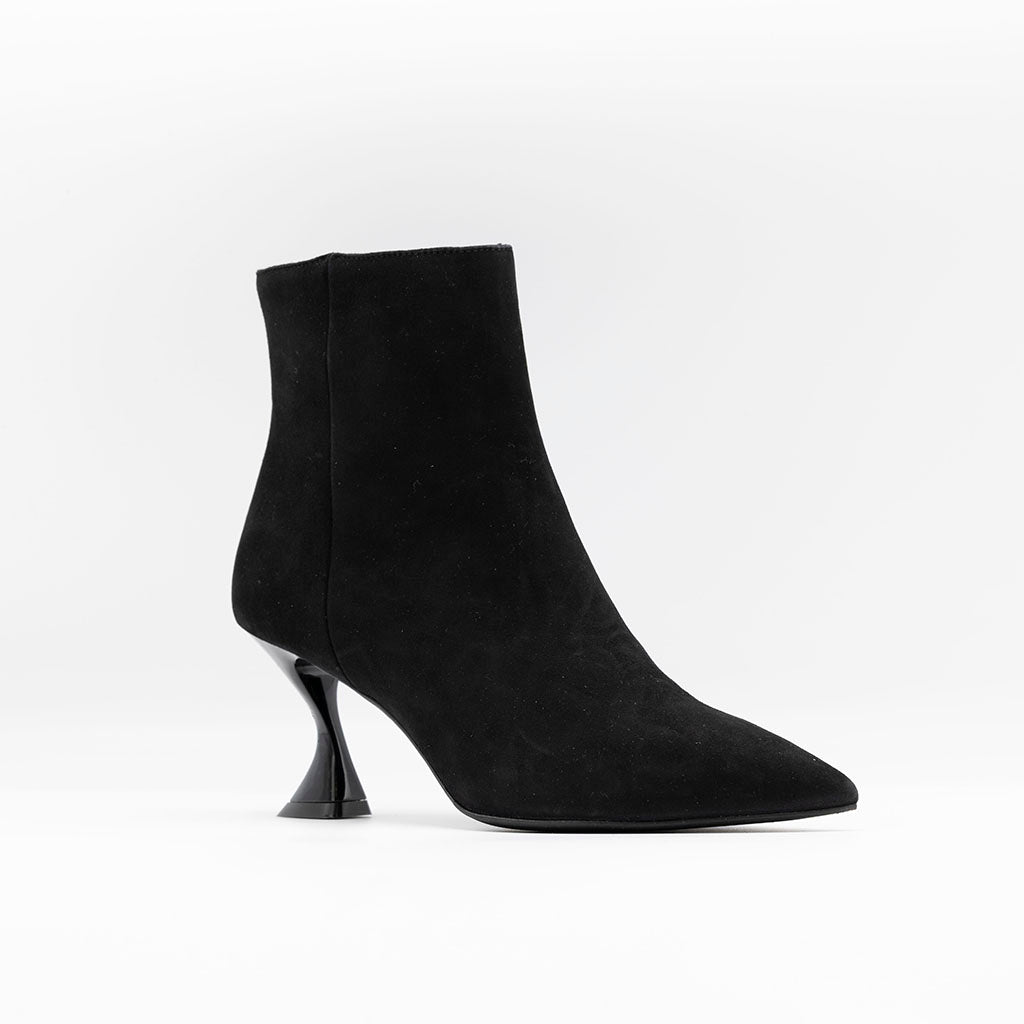 Black suede ankle boots with curved heel. 