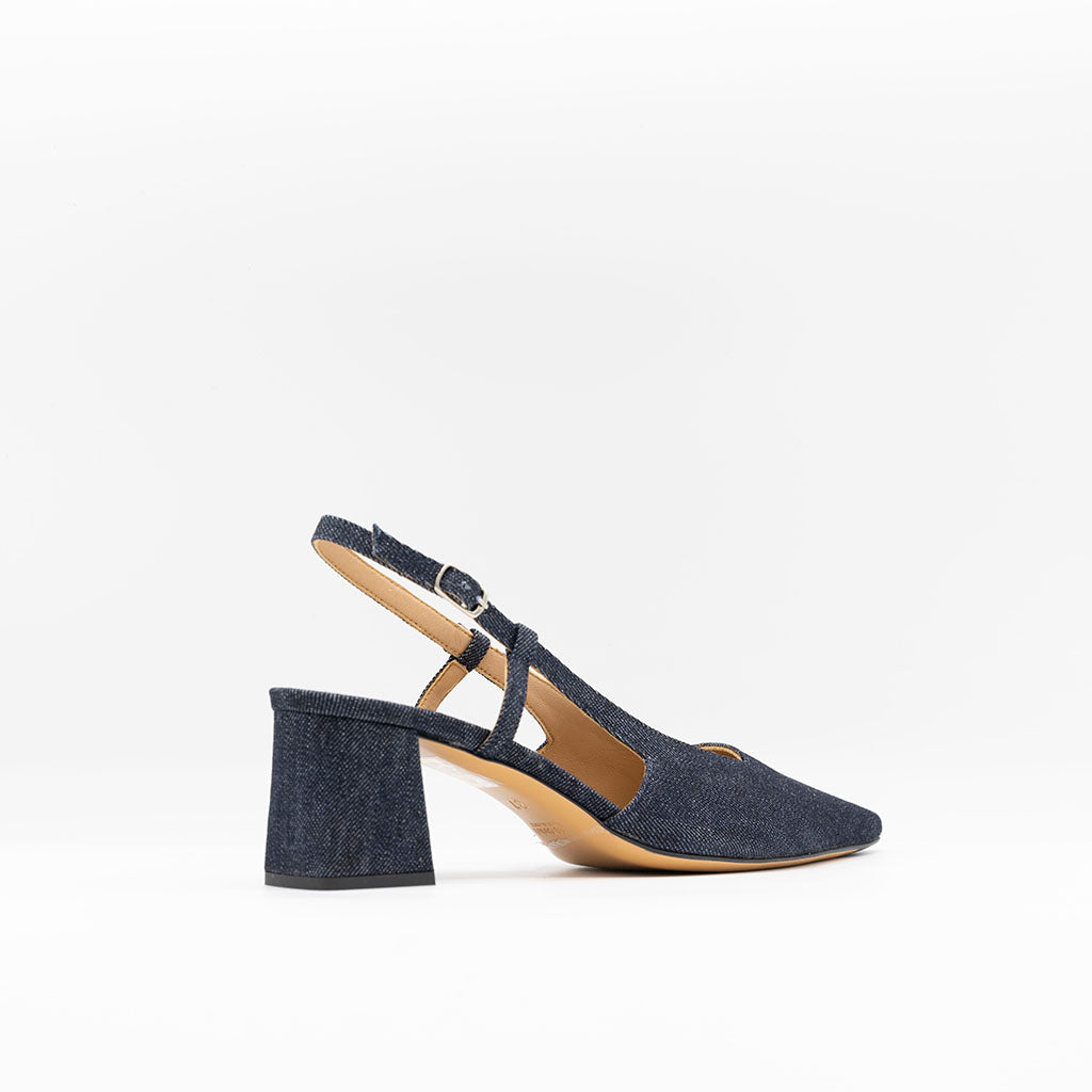 Slanted Block heeled slingback with square toe in raw denim. 