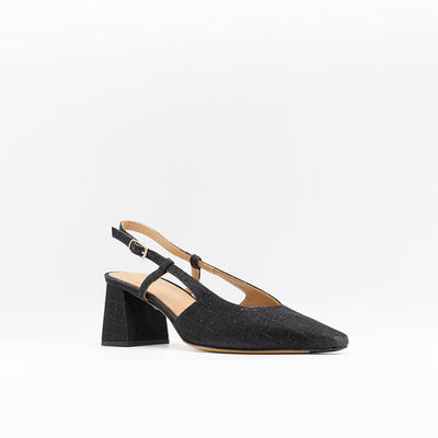 Block heeled slingback in black glitter fabric. With slightly slanted heel.
