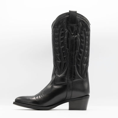 Black leather cowboy boots. 