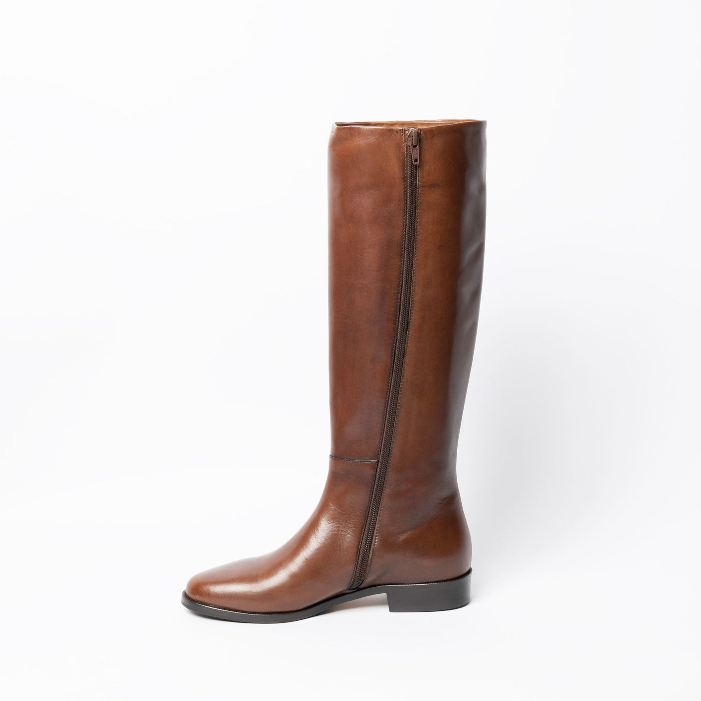 Women's brown leather riding boot. 