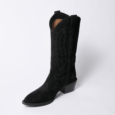 Black suede cowboy boots.