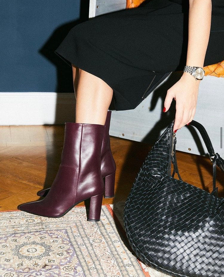 Burgundy leather ankle boots with straight shaft. 